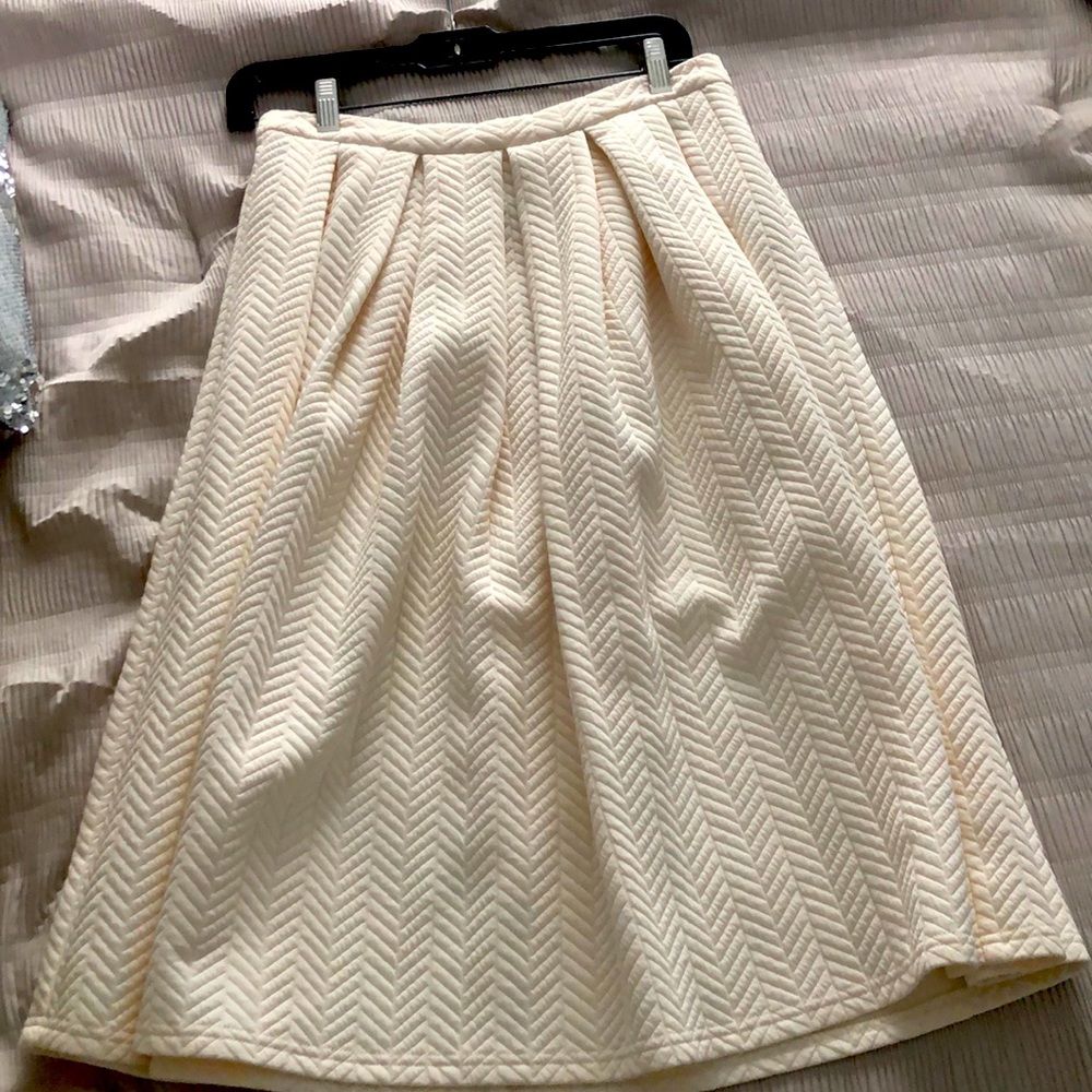 STOREE pleated, patterned skirt. Only worn once.